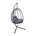 Silla colgante tipo huevo BREEZEE con soporte de piso, ratán negro y cojín gris