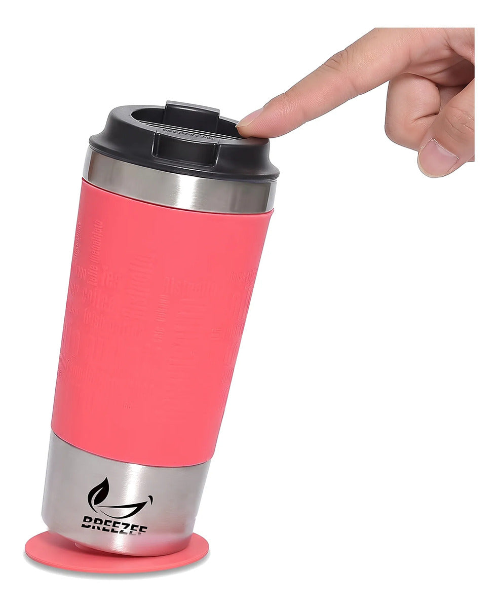 Termo BREEZEE de 450 ml coral inclinado sobre su ventosa anticaída